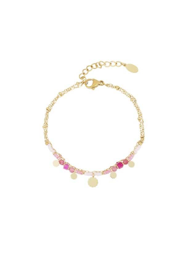 Gold plated dubbel armbandje met verschillende roze kralen en mini bedeltjes