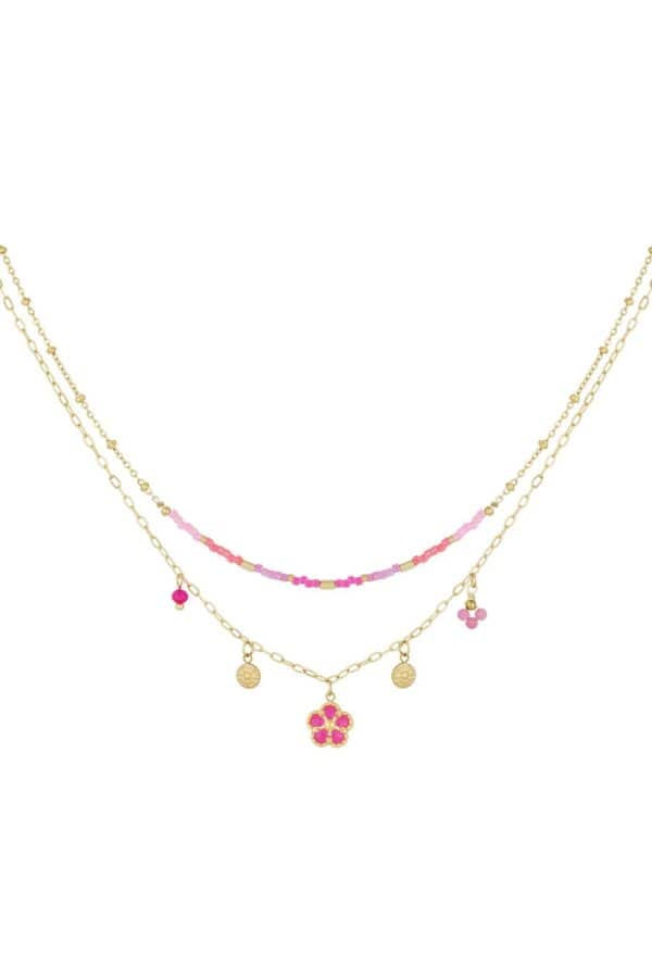 Dubbele fijne ketting met roze kraaltjes en bedels
